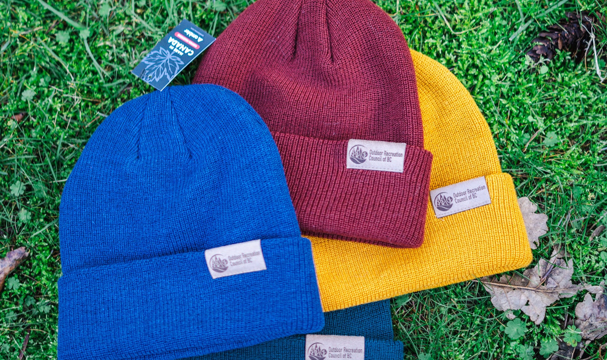 Custom toque with a branded patch, made in Canada