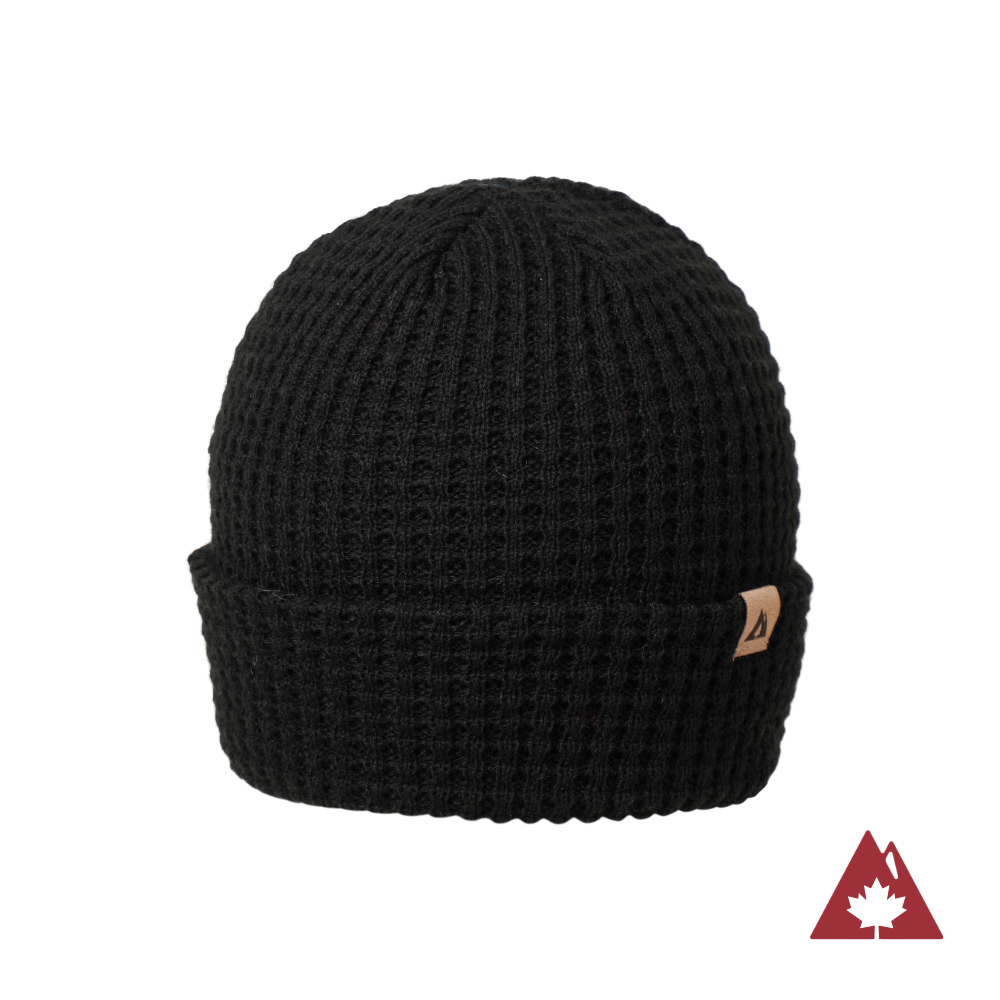 Made in Canada Ambler honeycomb machine knit toque in black with faux leather brand clip. 
