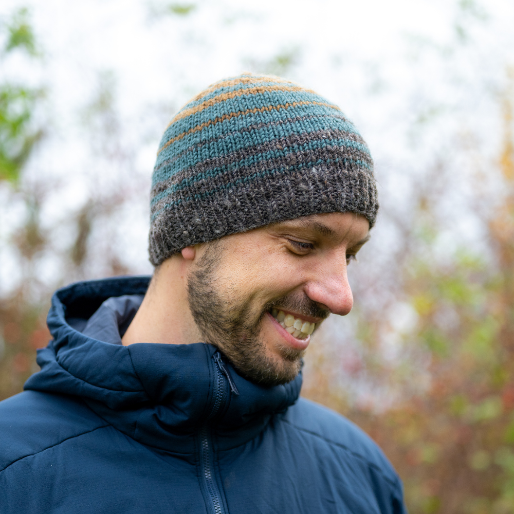 Ambler Ollie handknit wool men's toque in heather brown with striped design and warm ribbed cuff. 