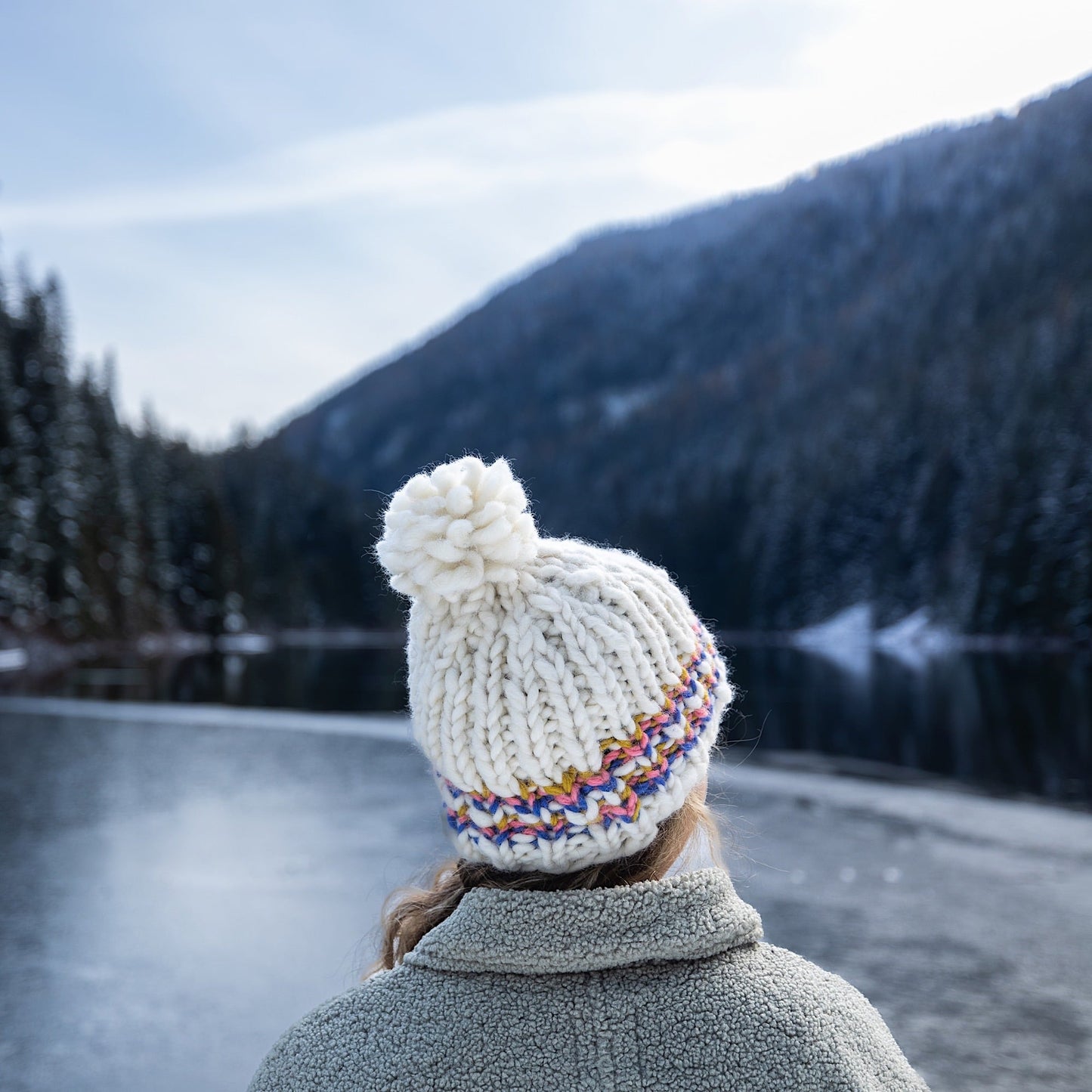 Ambler Parker handknit wool women's toque in cream - thick rib and medium pom. 