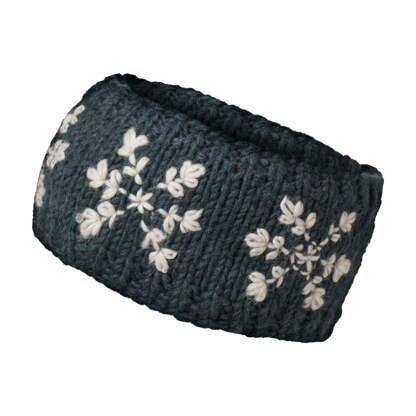 Ambler Stellar handknit winter headband in blue spruce with snowflakes pattern and fleece lining. 