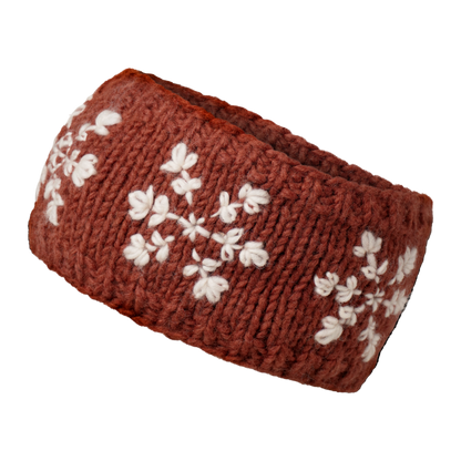 Ambler Stellar handknit winter headband in brick with snowflakes pattern and fleece lining. 