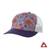 Purple kids' trucker hat with a dark purple brim, white mesh back and colourful floral pattern on the front panel.