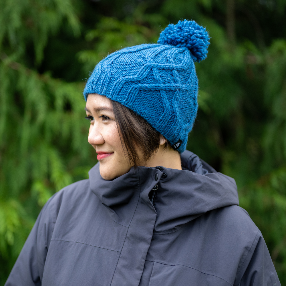Ambler Tracks handknit wool women's toque in dusk with cable knit pattern and medium pom. 