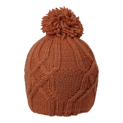 Ambler Tracks handknit wool women's toque in rust with cable knit pattern and medium pom. 